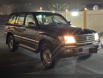 تويوتا  لاند كروزر  جي اكس ار  2003  اوتوماتيك  250,000 كم  6 سلندر  دفع رباعي  اس يو في  أزرق غامق  تحت الضمان