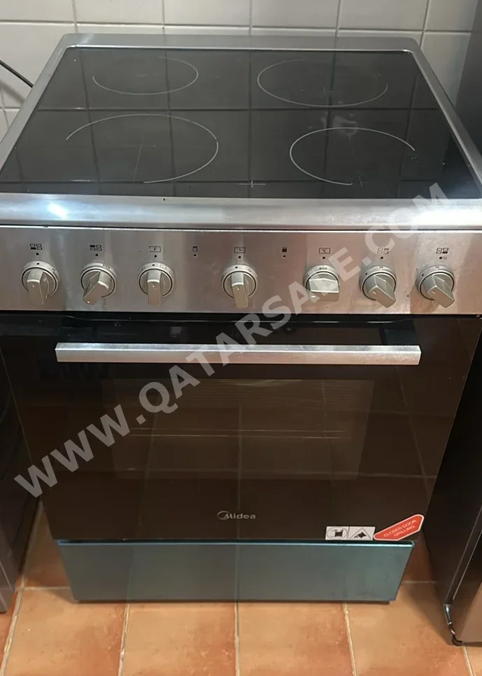 الطباخ 4 \  كهربائي  أسود