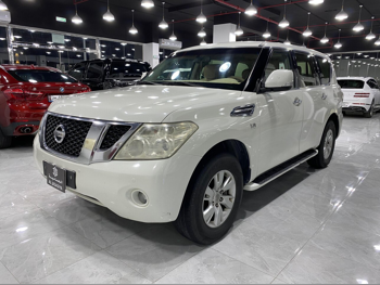 Nissan  Patrol  SE  2013  Automatic  342,000 Km  8 Cylinder  Four Wheel Drive (4WD)  SUV  White