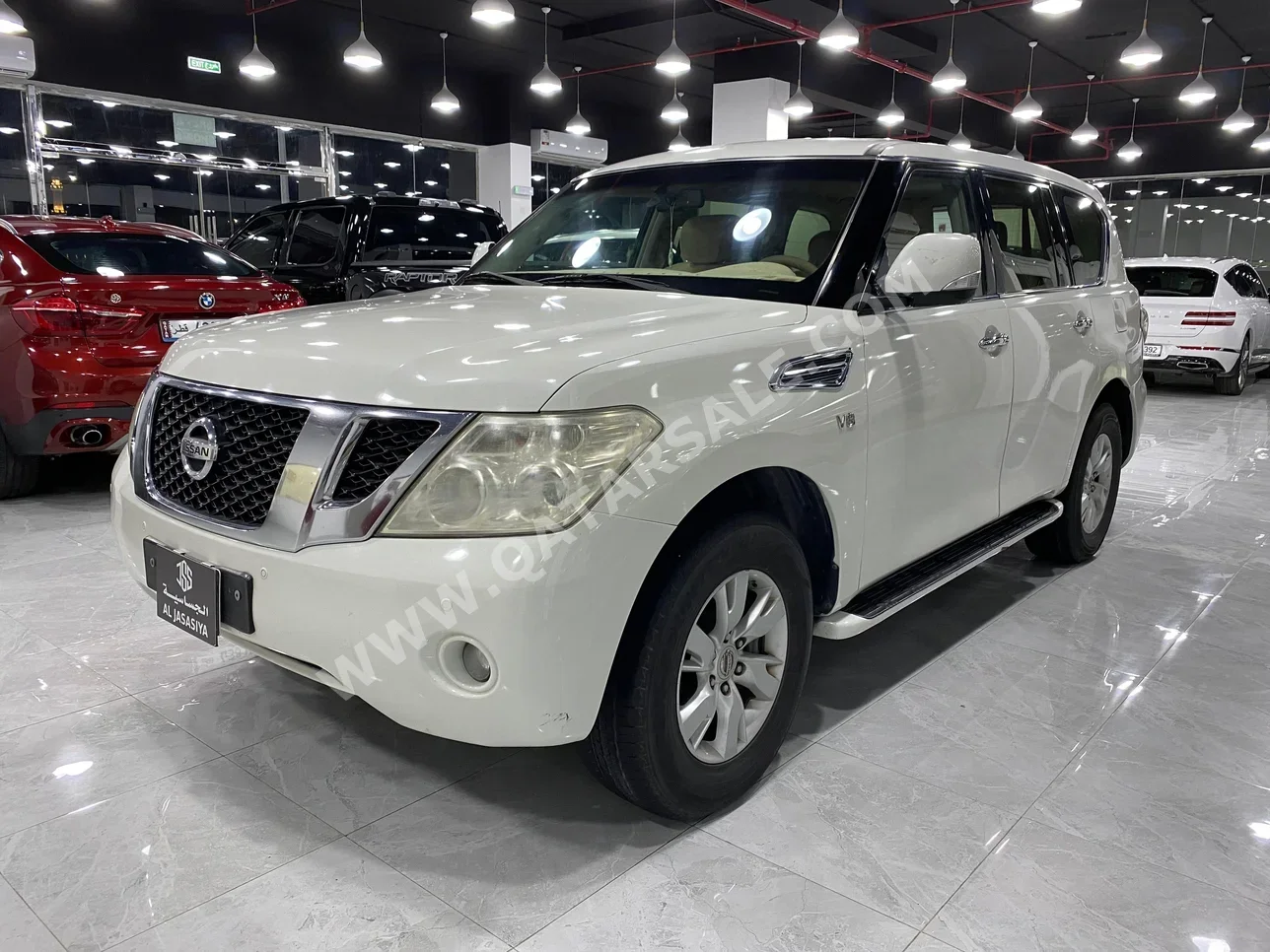 Nissan  Patrol  SE  2013  Automatic  342,000 Km  8 Cylinder  Four Wheel Drive (4WD)  SUV  White