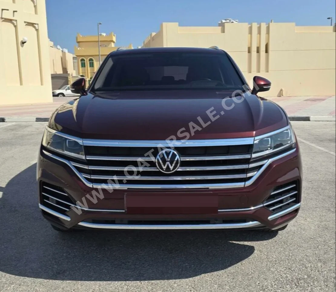 Volkswagen  Touareg  Sport  2022  Automatic  39,000 Km  6 Cylinder  All Wheel Drive (AWD)  SUV  Maroon  With Warranty