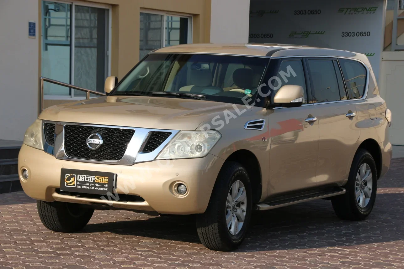 Nissan  Patrol  SE  2013  Automatic  283,000 Km  8 Cylinder  Four Wheel Drive (4WD)  SUV  Beige