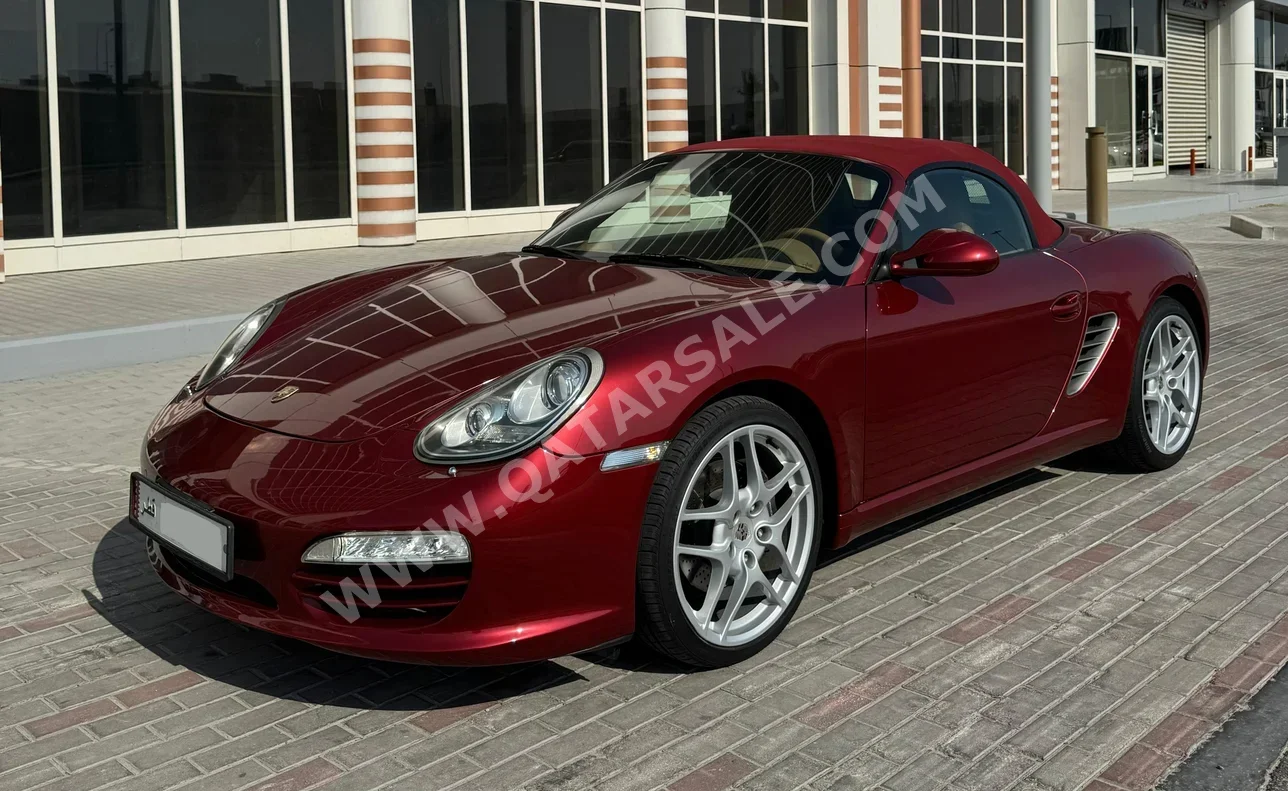 Porsche  Boxster  2012  Automatic  124,000 Km  4 Cylinder  Rear Wheel Drive (RWD)  Convertible  Maroon