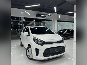 Kia  Picanto  2023  Automatic  9,000 Km  4 Cylinder  Front Wheel Drive (FWD)  Sedan  White  With Warranty