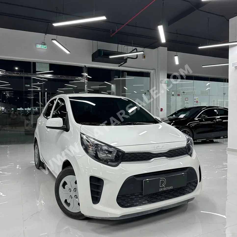 Kia  Picanto  2023  Automatic  9,000 Km  4 Cylinder  Front Wheel Drive (FWD)  Sedan  White  With Warranty