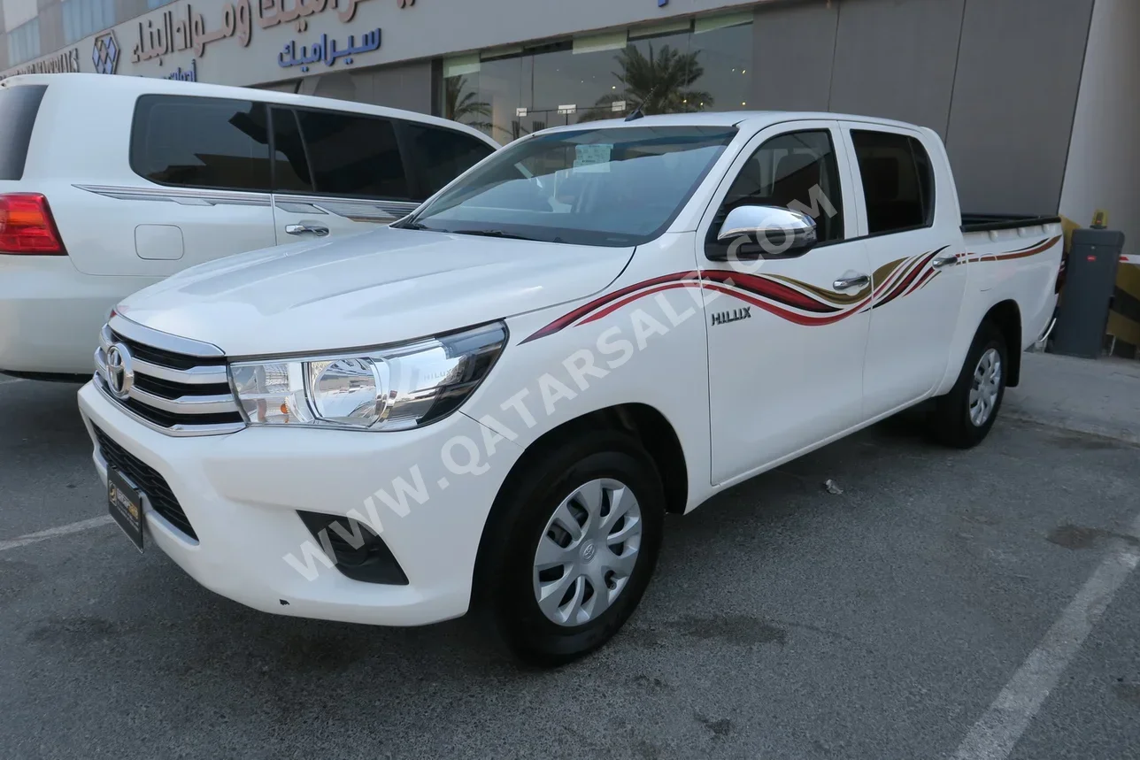 Toyota  Hilux  2021  Manual  121,000 Km  4 Cylinder  Four Wheel Drive (4WD)  Pick Up  White and Black