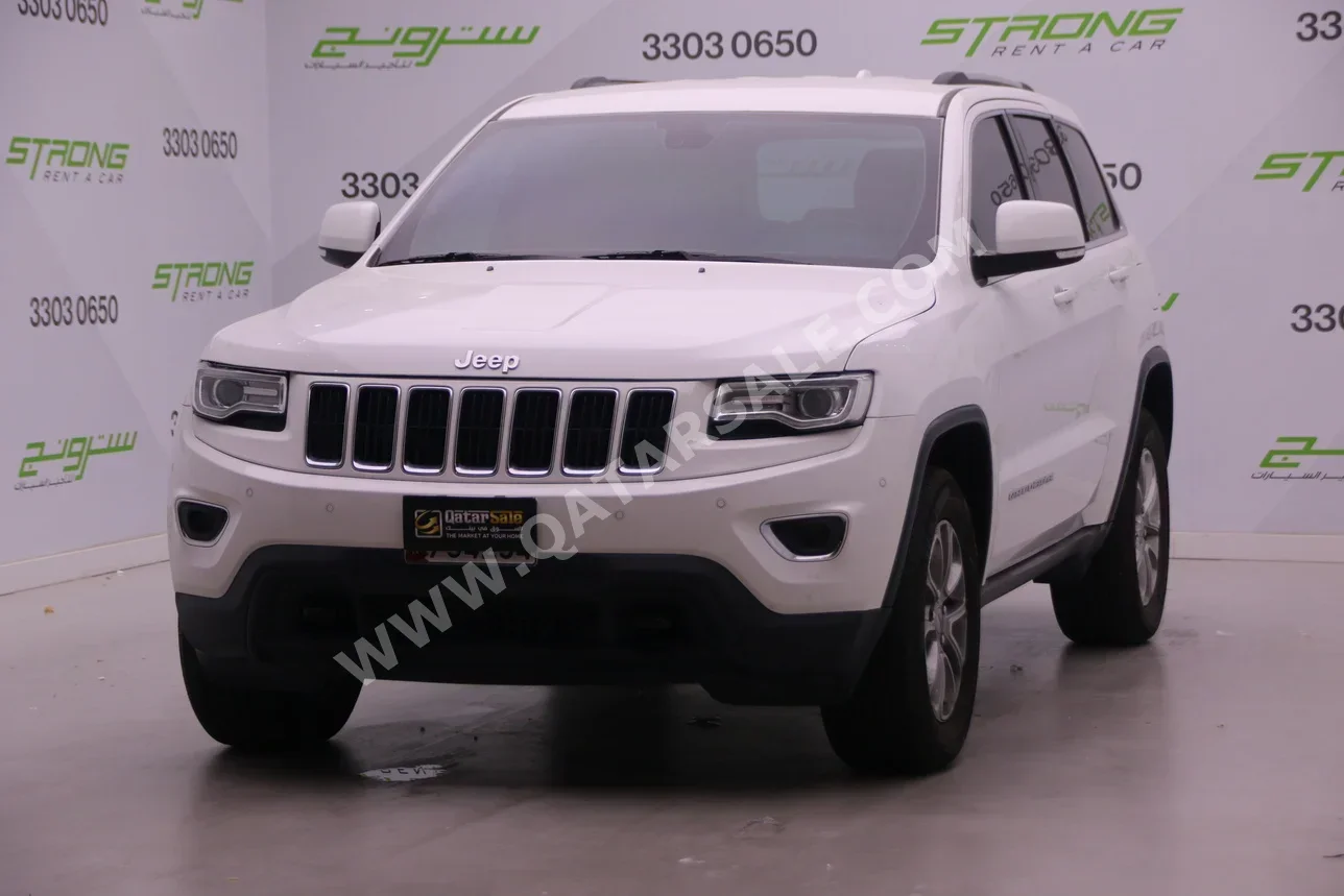 Jeep  Grand Cherokee  Laredo  2016  Automatic  90,000 Km  6 Cylinder  Four Wheel Drive (4WD)  SUV  Silver
