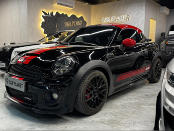 Mini  Cooper  JCW  2014  Automatic  98,000 Km  4 Cylinder  Front Wheel Drive (FWD)  Convertible  Black