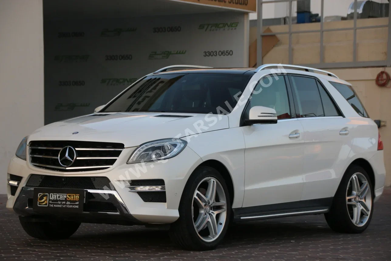 Mercedes-Benz  ML  400  2015  Automatic  60,000 Km  6 Cylinder  Four Wheel Drive (4WD)  SUV  White