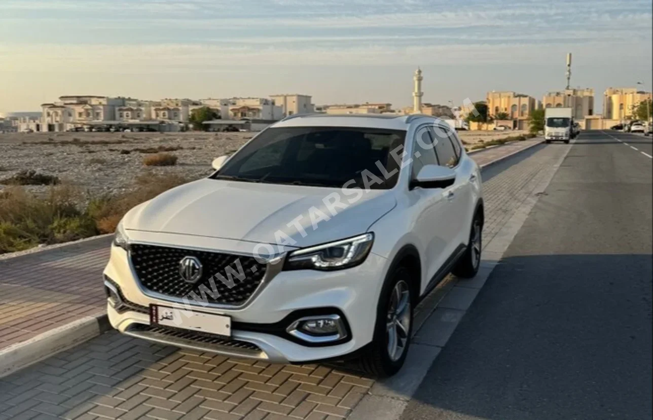 MG  HS  Sport  2023  Automatic  8,000 Km  4 Cylinder  All Wheel Drive (AWD)  SUV  White  With Warranty