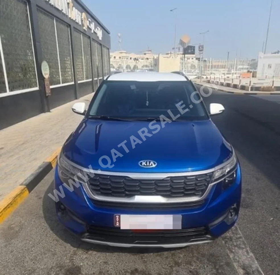 Kia  Seltos  EX  2021  Automatic  47,000 Km  4 Cylinder  Front Wheel Drive (FWD)  SUV  Blue and White  With Warranty