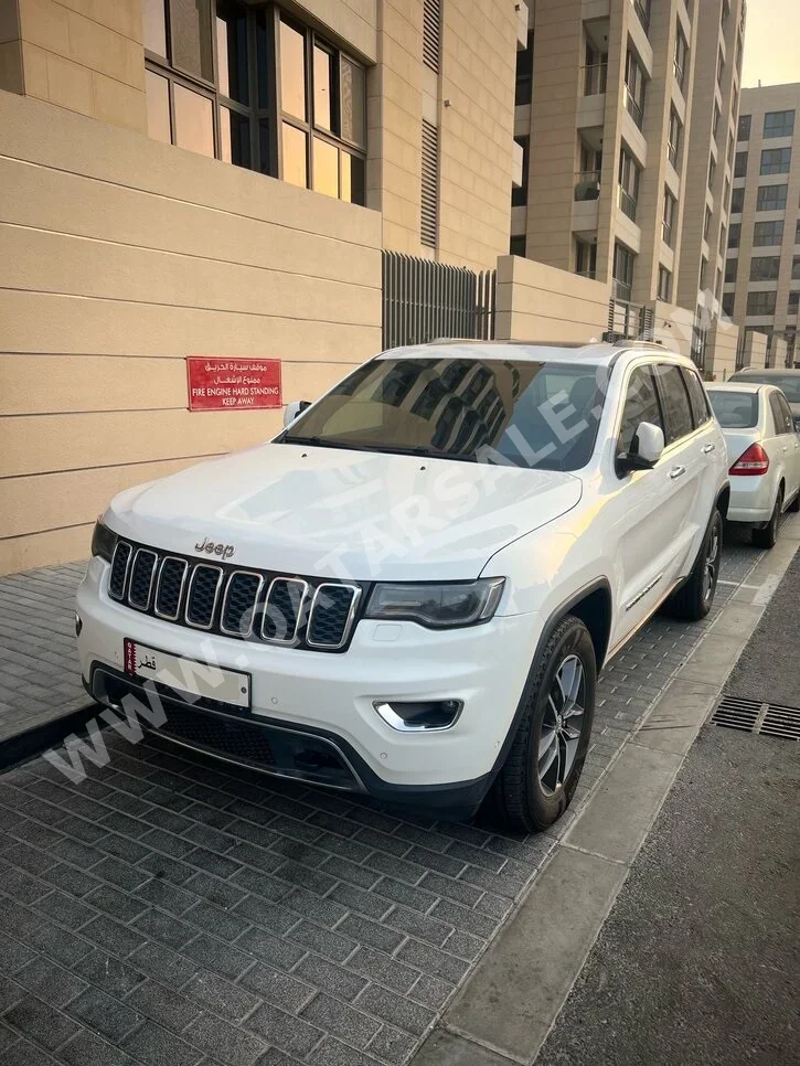 Jeep  Grand Cherokee  Limited  2018  Automatic  129,000 Km  8 Cylinder  Four Wheel Drive (4WD)  SUV  White