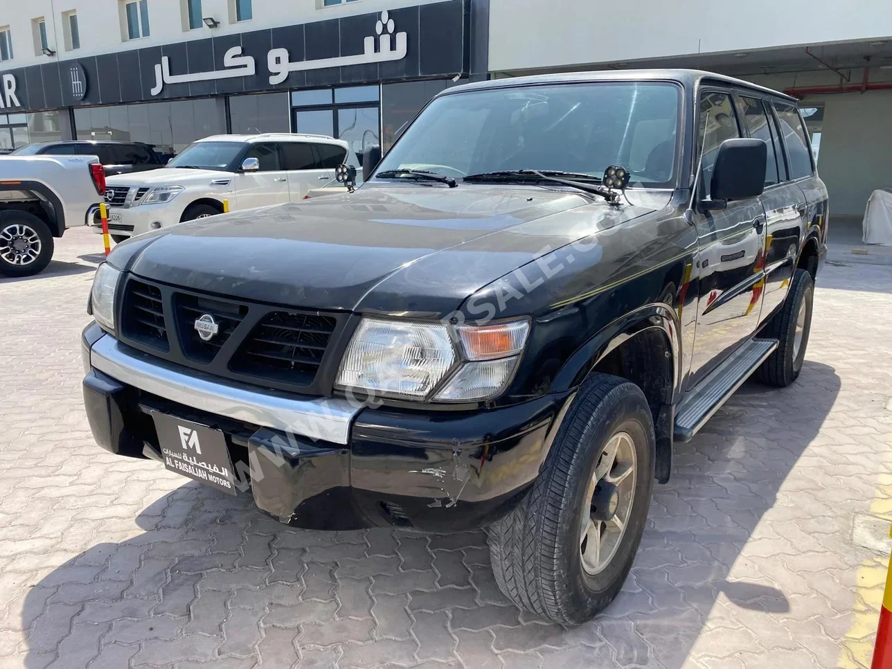 نيسان  باترول  سفاري  2000  عادي  600,000 كم  6 سلندر  سحب امامي  اس يو في  أسود