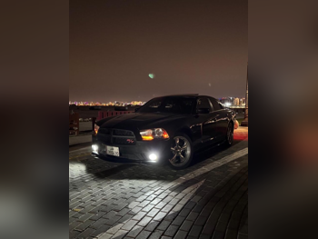 Dodge  Charger  RT  2011  Tiptronic  215,000 Km  8 Cylinder  Rear Wheel Drive (RWD)  Sedan  Black