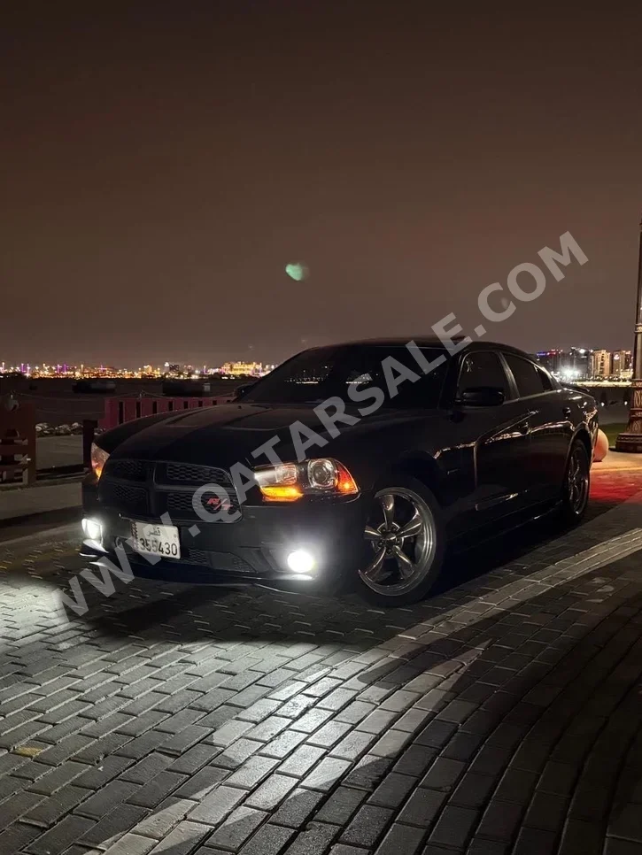 دودج  تشارجر  ار تي  2011  تبترونك  215,000 كم  8 سلندر  دفع خلفي  سيدان  أسود