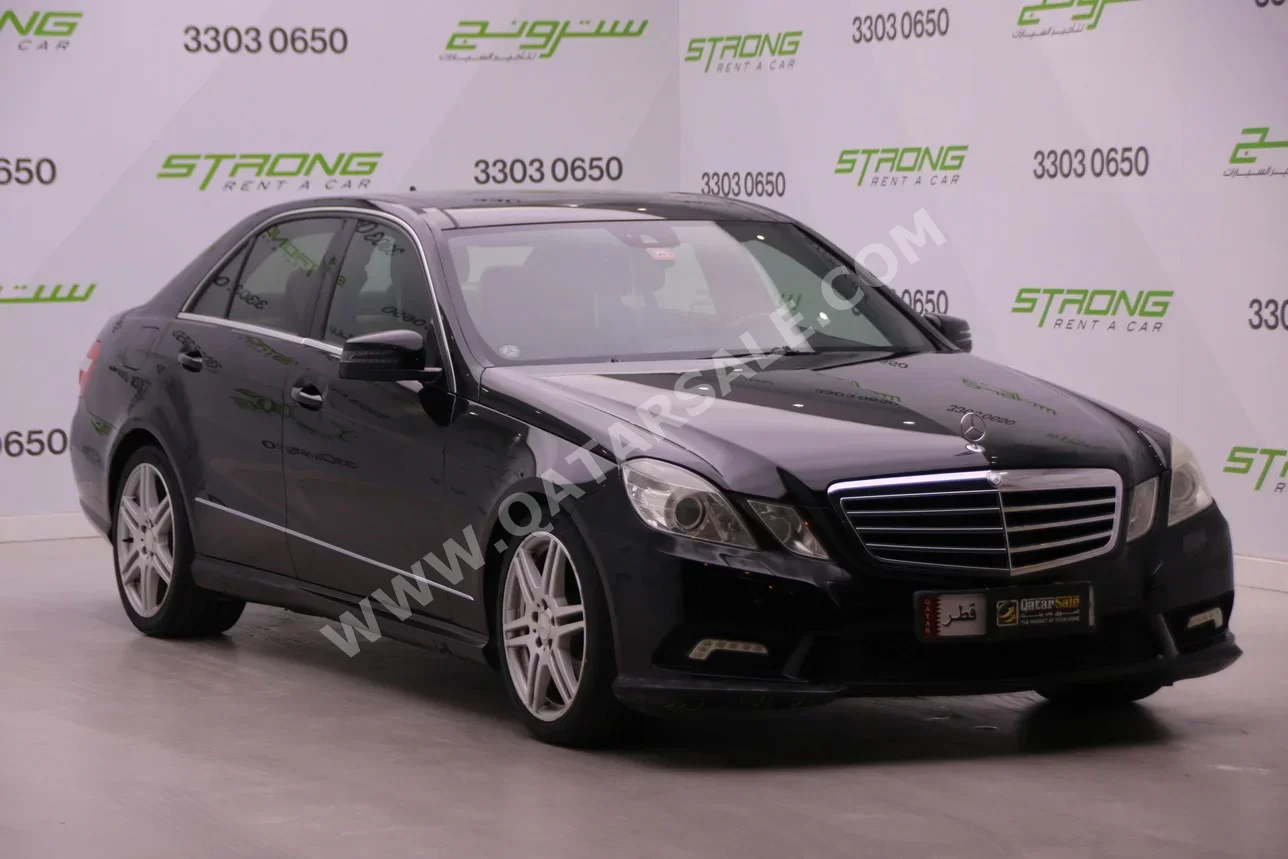 Mercedes-Benz  E-Class  300 AMG  2012  Automatic  233,560 Km  6 Cylinder  Rear Wheel Drive (RWD)  Sedan  Black