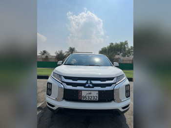 Mitsubishi  ASX  2024  Automatic  9,917 Km  4 Cylinder  Front Wheel Drive (FWD)  SUV  White  With Warranty