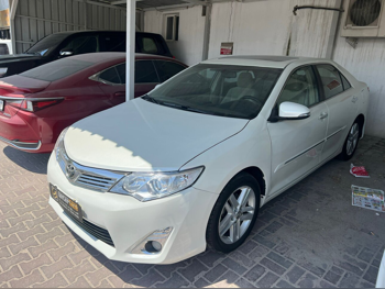 Toyota  Camry  2013  Automatic  330,000 Km  4 Cylinder  Front Wheel Drive (FWD)  Sedan  White