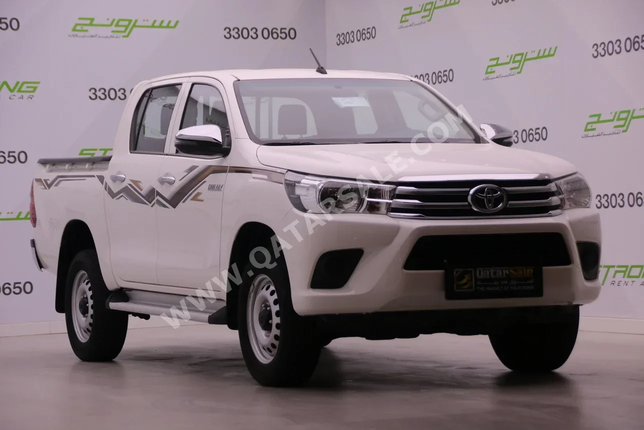 Toyota  Hilux  2024  Automatic  33,500 Km  4 Cylinder  Four Wheel Drive (4WD)  Pick Up  White  With Warranty