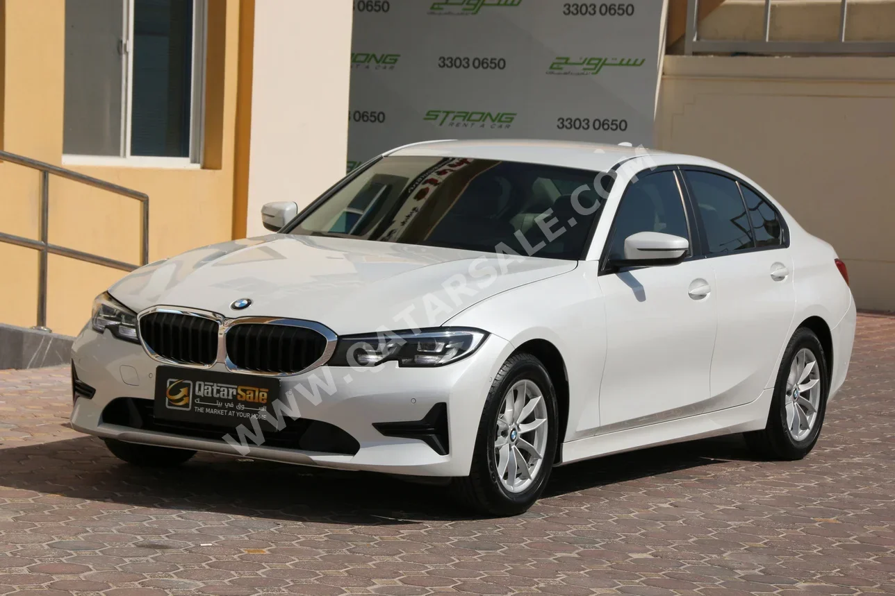 BMW  3-Series  320i  2021  Automatic  44,000 Km  4 Cylinder  Rear Wheel Drive (RWD)  Sedan  White  With Warranty