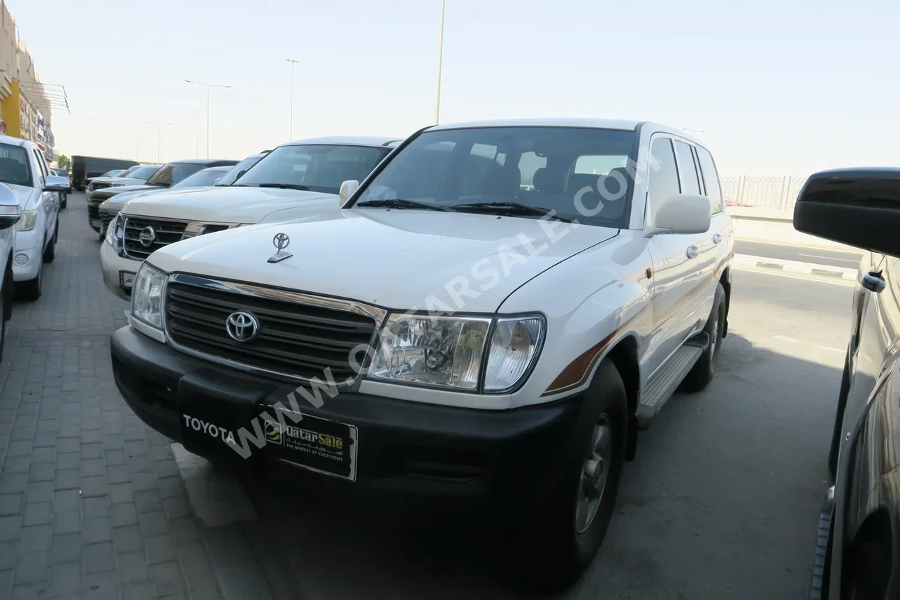 Toyota  Land Cruiser  GX  2005  Manual  87,000 Km  6 Cylinder  Four Wheel Drive (4WD)  SUV  White