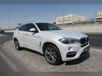 BMW  X-Series  X6  2019  Automatic  85,000 Km  6 Cylinder  Four Wheel Drive (4WD)  SUV  White  With Warranty