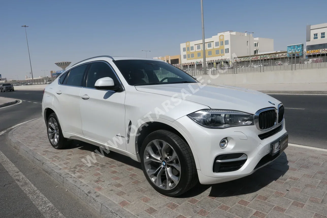 BMW  X-Series  X6  2019  Automatic  85,000 Km  6 Cylinder  Four Wheel Drive (4WD)  SUV  White  With Warranty