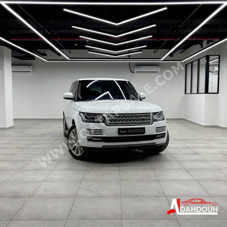 Land Rover  Range Rover  Vogue  2015  Automatic  233,000 Km  8 Cylinder  Four Wheel Drive (4WD)  SUV  White