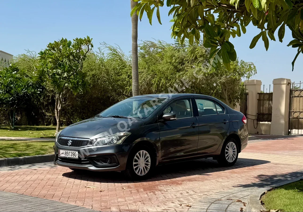 Suzuki  Ciaz  2023  Automatic  76,000 Km  4 Cylinder  Front Wheel Drive (FWD)  Sedan  Gray