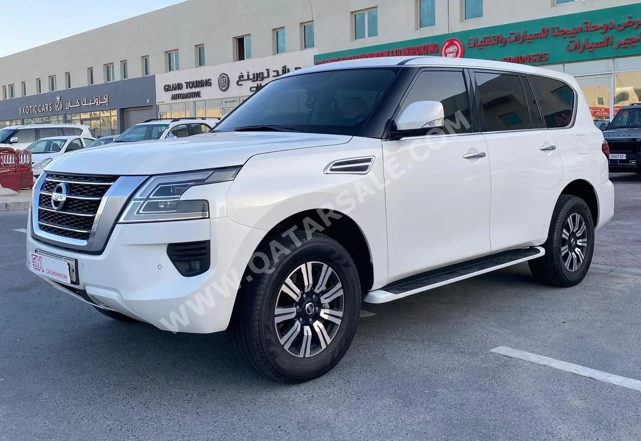 Nissan  Patrol  SE  2021  Automatic  179,000 Km  8 Cylinder  Four Wheel Drive (4WD)  SUV  White