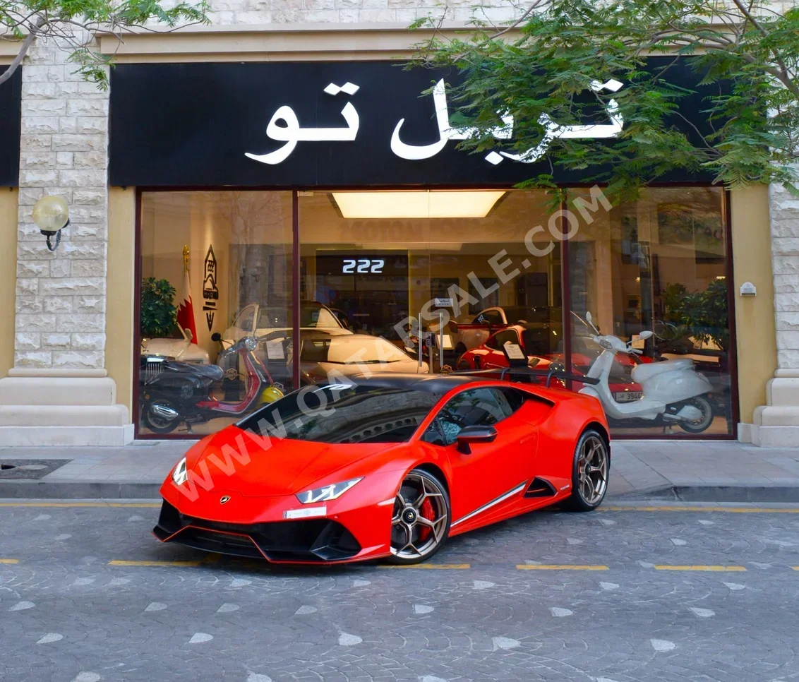 لمبرجيني  هركان  EVO  2021  اوتوماتيك  4,840 كم  10 سلندر  دفع خلفي  كوبيه \ سبورت  أحمر  تحت الضمان