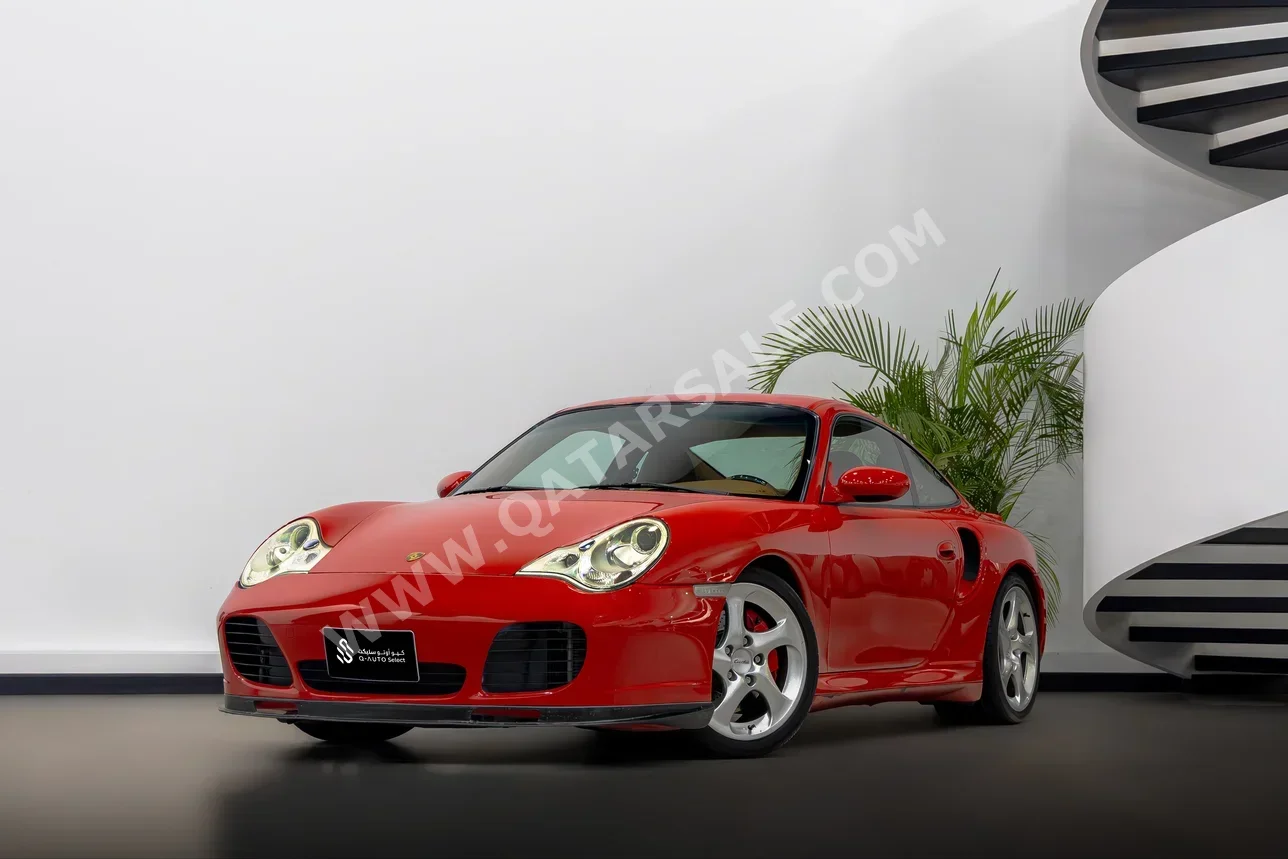 بورش  911  توربو  2002  اوتوماتيك  120,000 كم  6 سلندر  دفع خلفي  كوبيه \ سبورت  أحمر