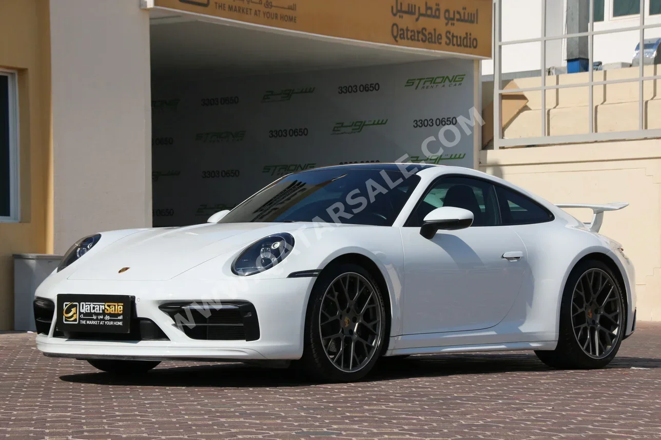 بورش  911  كاريرا  2022  اوتوماتيك  46,000 كم  6 سلندر  دفع خلفي  كوبيه \ سبورت  أبيض  تحت الضمان
