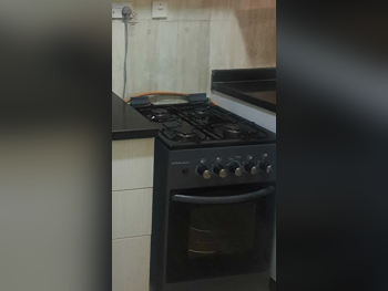 - غاز وكهرباء  - اللون الرمادي