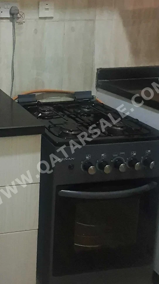 - غاز وكهرباء  - اللون الرمادي