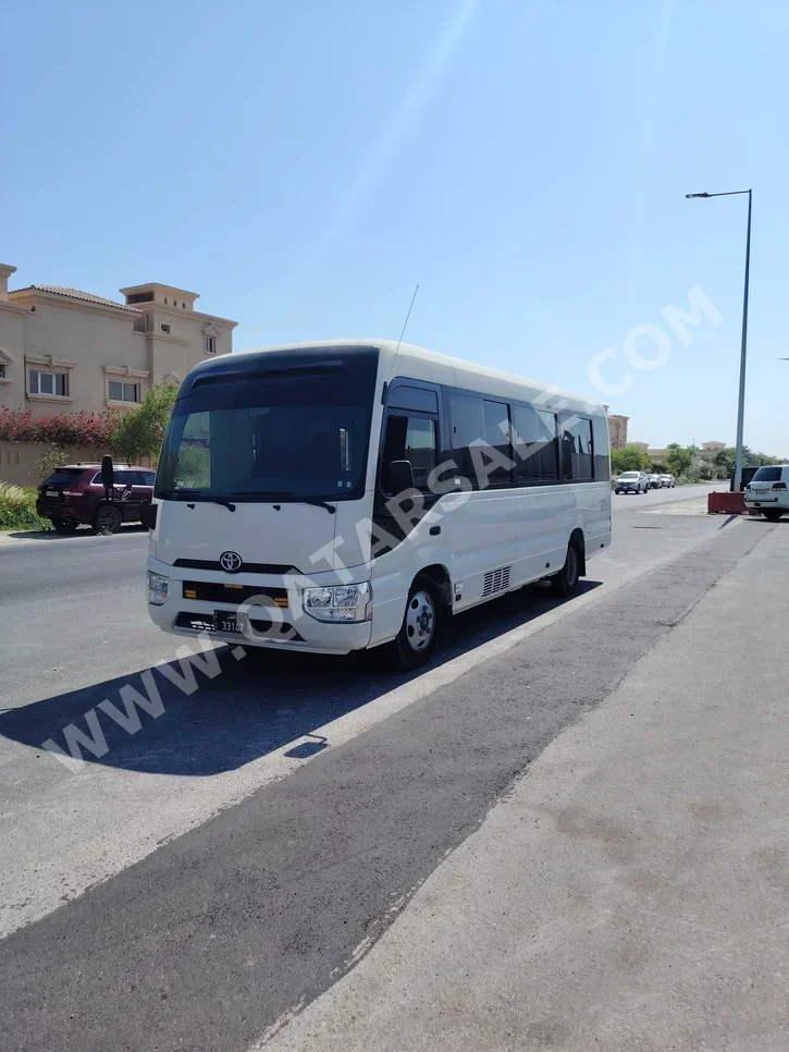 Toyota  Coaster  2022  Manual  160,000 Km  4 Cylinder  Rear Wheel Drive (RWD)  Van / Bus  White