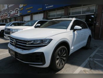 Volkswagen  Touareg  2024  Automatic  300 Km  6 Cylinder  All Wheel Drive (AWD)  SUV  White  With Warranty