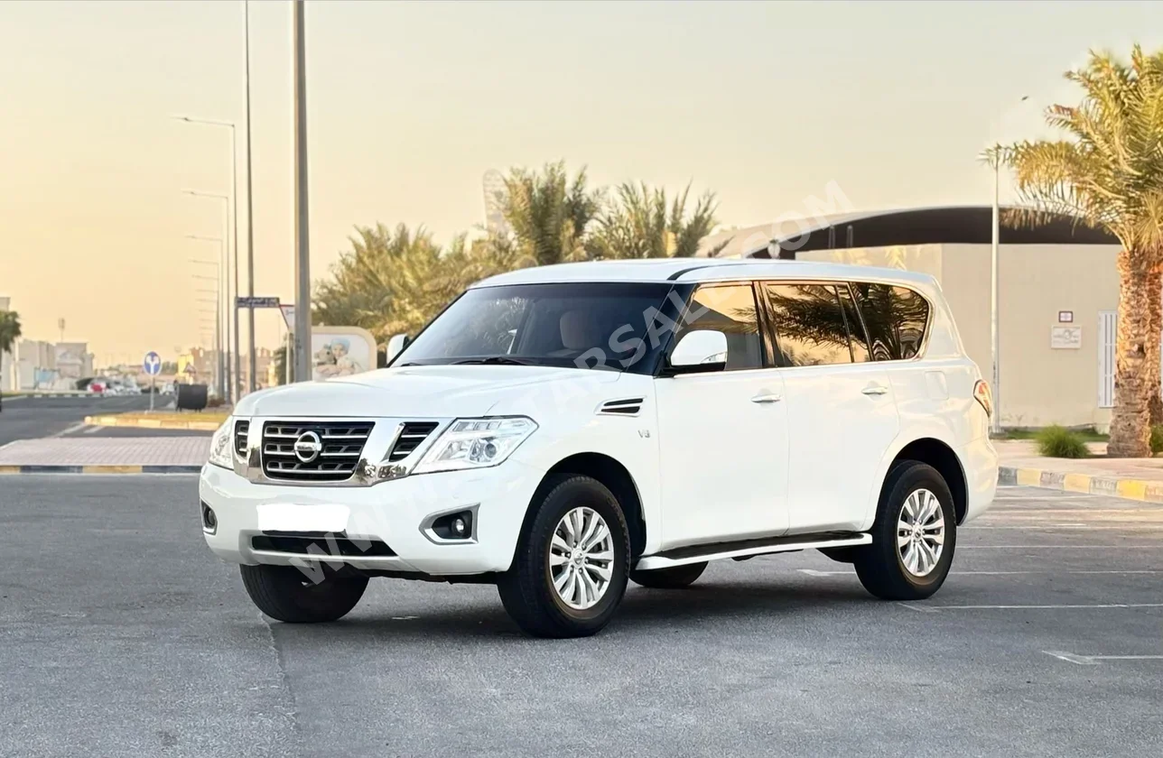 Nissan  Patrol  XE  2014  Automatic  322,000 Km  8 Cylinder  Four Wheel Drive (4WD)  SUV  White