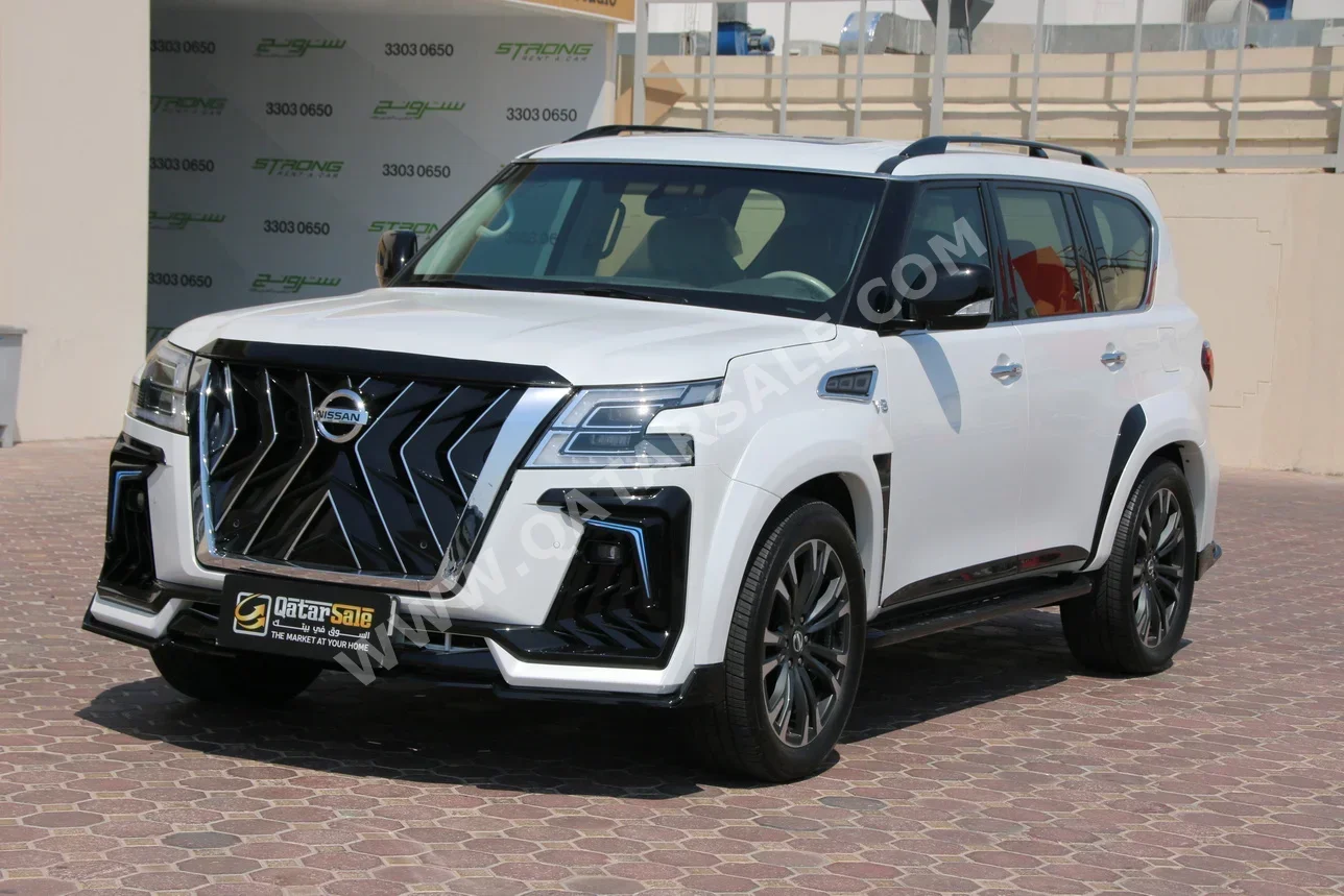 Nissan  Patrol  Platinum  2014  Automatic  226,000 Km  8 Cylinder  Four Wheel Drive (4WD)  SUV  White