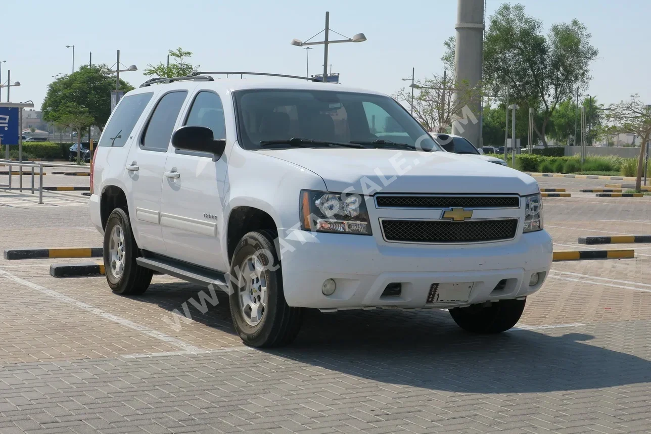 Chevrolet  Tahoe  2013  Automatic  244,000 Km  8 Cylinder  Four Wheel Drive (4WD)  SUV  White