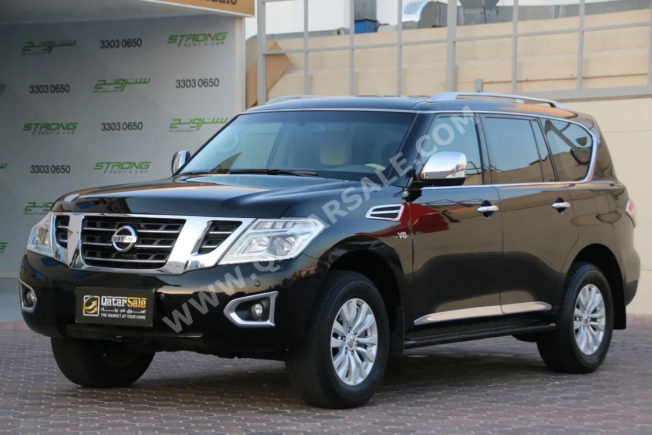 Nissan  Patrol  SE  2015  Automatic  218,000 Km  8 Cylinder  Four Wheel Drive (4WD)  SUV  Black