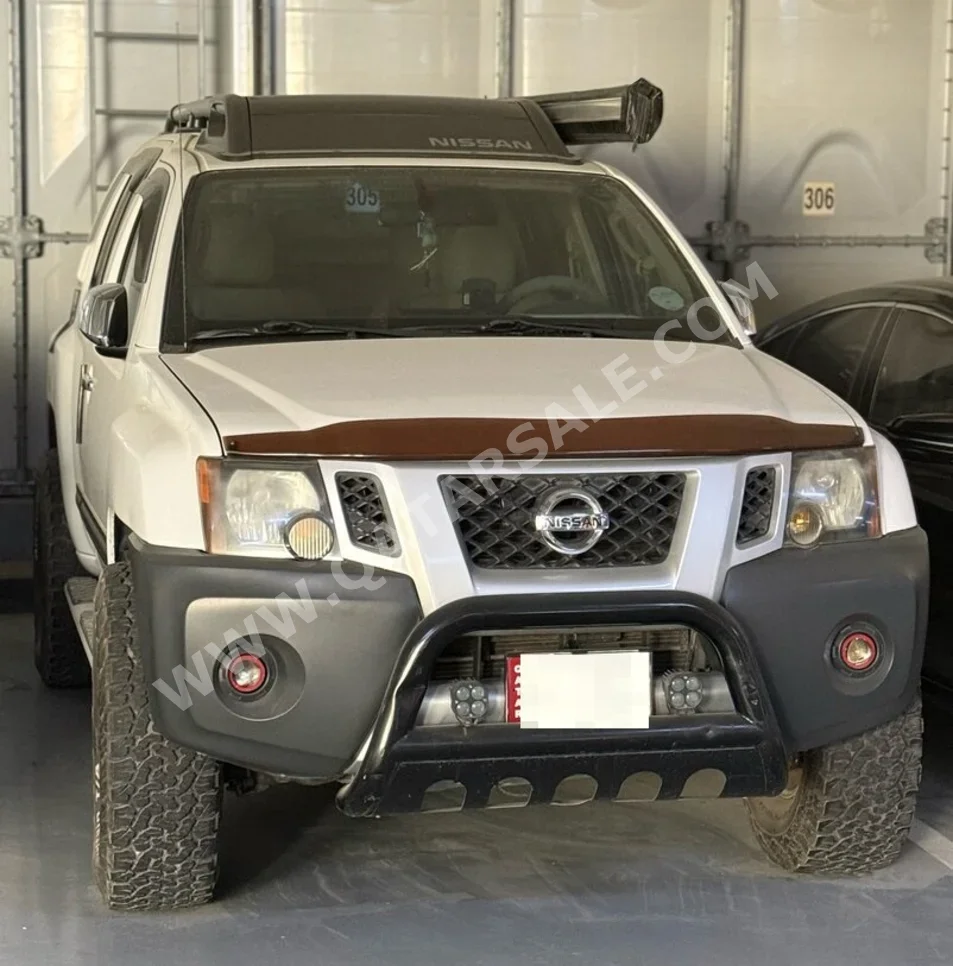 Nissan  Xterra  SE  2012  Automatic  298,000 Km  6 Cylinder  Four Wheel Drive (4WD)  SUV  White