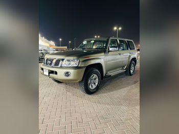 Nissan  Patrol  Safari  2024  Manual  0 Km  6 Cylinder  Four Wheel Drive (4WD)  SUV  Gold  With Warranty