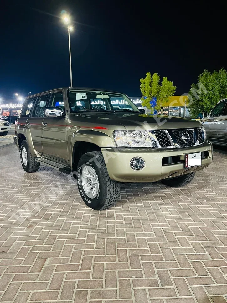 Nissan  Patrol  Super Safari  2024  Manual  0 Km  6 Cylinder  Four Wheel Drive (4WD)  SUV  Gold  With Warranty