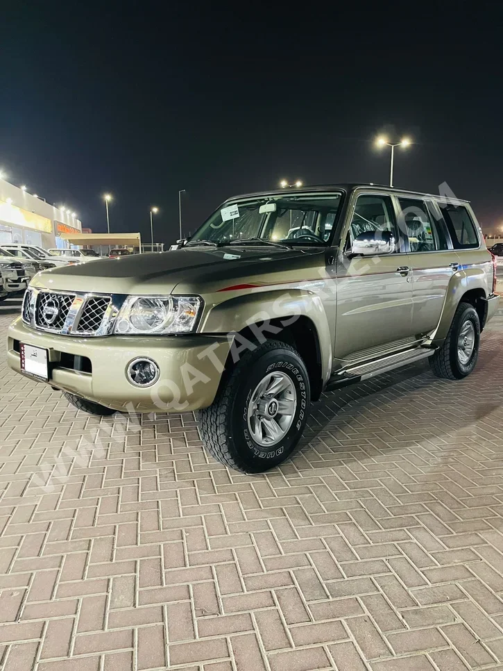 Nissan  Patrol  Safari  2024  Manual  0 Km  6 Cylinder  Four Wheel Drive (4WD)  SUV  Gold  With Warranty