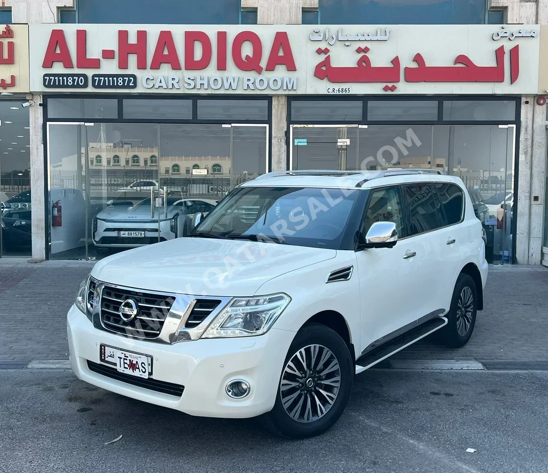 Nissan  Patrol  Platinum  2019  Automatic  141,000 Km  8 Cylinder  Four Wheel Drive (4WD)  SUV  White