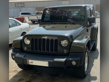 Jeep  Wrangler  Sahara  2015  Automatic  178,000 Km  6 Cylinder  Four Wheel Drive (4WD)  SUV  Olive Green