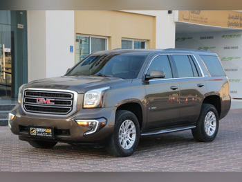 GMC  Yukon  SLE  2016  Automatic  171,000 Km  8 Cylinder  Four Wheel Drive (4WD)  SUV  Bronze