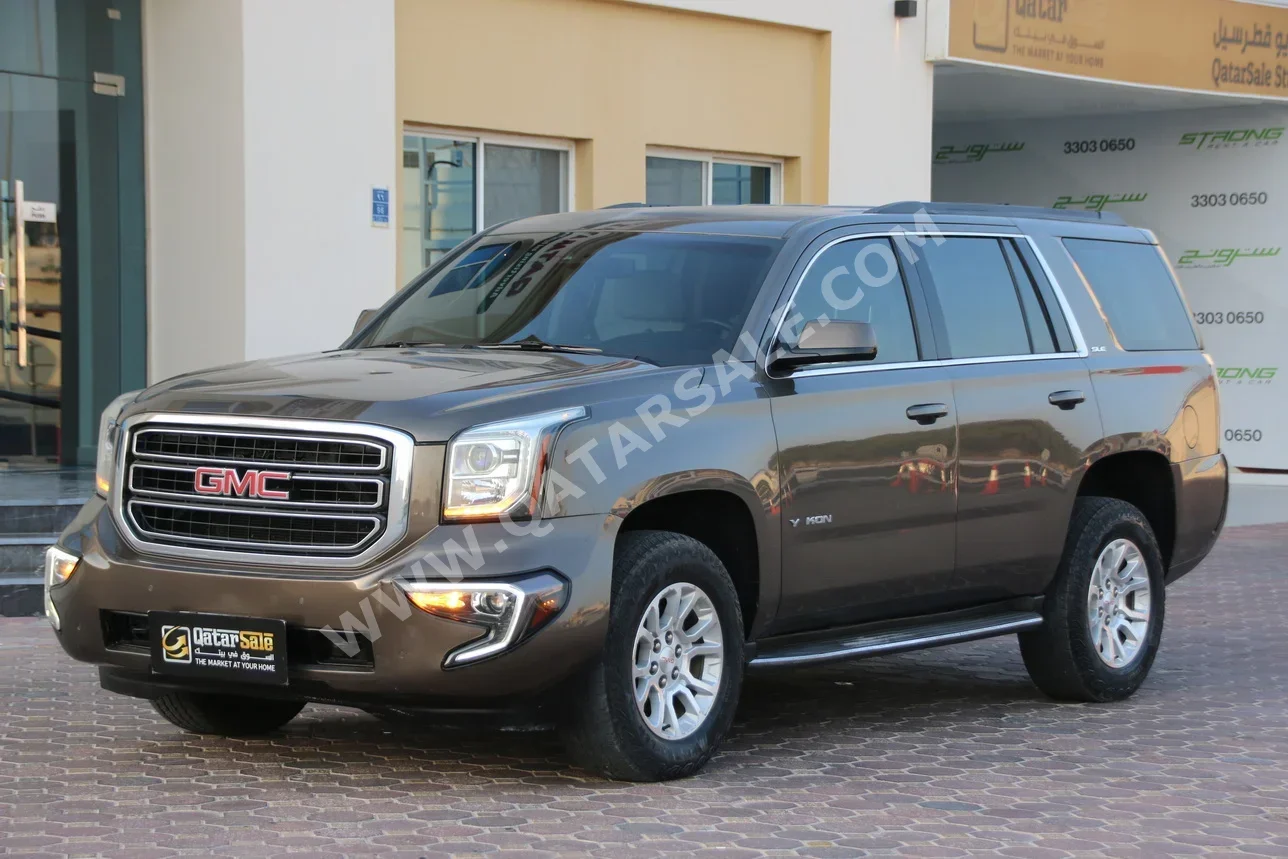 GMC  Yukon  SLE  2016  Automatic  171,000 Km  8 Cylinder  Four Wheel Drive (4WD)  SUV  Bronze