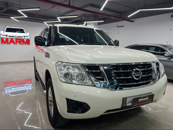 Nissan  Patrol  XE  2019  Automatic  130,000 Km  6 Cylinder  Four Wheel Drive (4WD)  SUV  White
